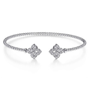 Gabriel & Co. BG4256-57W45JJ 14 karat white gold Bujukan bangle, front view of matching four petal caps lined with small stones facing across a gap in the beads
