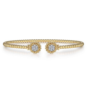 Gabriel & Co. BG4259-57Y45JJ 14 karat yellow gold Bujukan bangle, front view of two round diamond caps facing each other across the gap