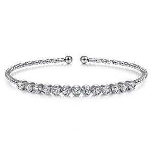 Gabriel & Co. BG4287-62W45JJ 14 karat white gold Bujukan bangle, front view of an open beaded cuff with a straight row of notched bezel diamonds and ball ends