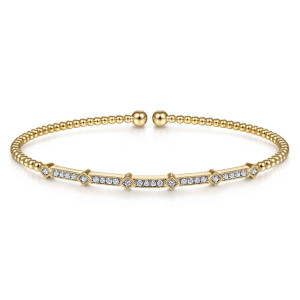 Gabriel & Co. BG4337-57Y45JJ 14 karat yellow gold Bujukan bangle, front view of the diamond bar split by small square stations above the bead band