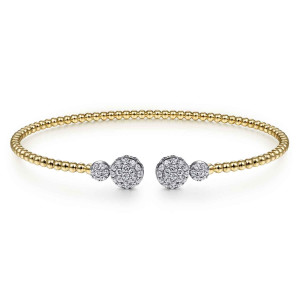 Gabriel & Co. BG4342-57M45JJ 14 karat white and yellow gold Bujukan bangle, front view of the two pave discs and smaller discs facing across the gap
