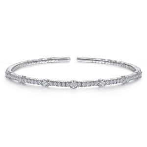 Gabriel & Co. BG4430-65W45JJ 14 karat white gold Lusso bangle, front view of a line of tiny diamonds with larger stones rising at intervals, the gap behind