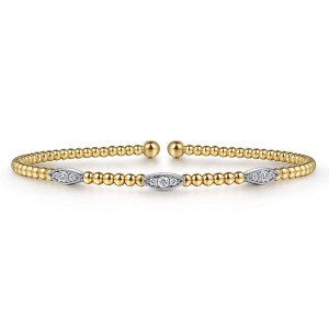 Gabriel & Co. BG4437-6M45JJ 14 karat white and yellow gold Bujukan bangle, front view of three pointed oval stations with milgrain edges between runs of beads