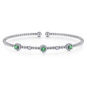 Gabriel & Co. BG4438-62W45EA 14 karat white gold Bujukan bangle, front view of green halos alternating with single diamonds on the bead strand
