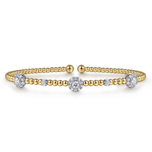 Gabriel & Co. BG4440-57M45JJ 14 karat white and yellow gold Bujukan bangle, front view of the three round stations alternating with small single diamonds on the beads