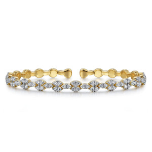 Gabriel & Co. BG4444-65Y45JJ 14 karat yellow gold Lusso bangle, front view of four stone diamond clusters alternating with small pointed clusters