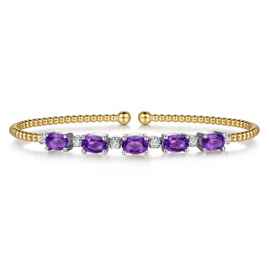 Gabriel & Co. BG4448-57M45AM 14 karat white and yellow gold Bujukan bangle, front view of the row of purple ovals alternating with small diamonds between bead ends