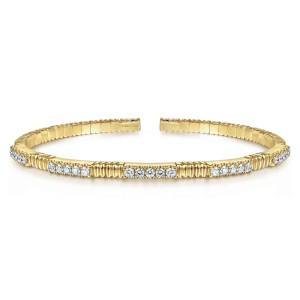 Gabriel & Co. BG4466-57Y45JJ 14 karat yellow gold Contemporary bangle, front view of the diamond groups set between finely ribbed barrels on the polished band