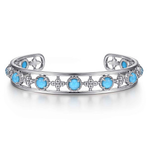 Gabriel & Co. BG4591-57SVJXT sterling silver Bujukan bangle, front view of round blue stones alternating with metal bead clusters between two rails
