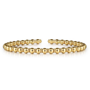 Gabriel & Co. BG4600-57Y4JJJ 14 karat yellow gold Bujukan bangle, front view of large round beads alternating with fine granulated spacers, ending in short bars at the gap