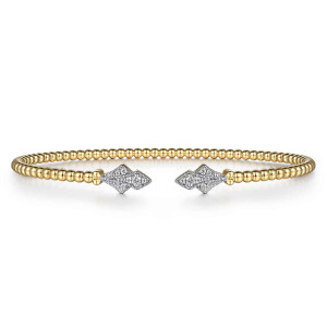 Gabriel & Co. BG4612-57Y45JJ 14 karat yellow gold Bujukan bangle, front view of two pointed diamond plates with beaded edges facing across the open gap