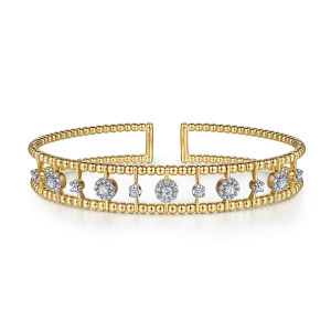 Gabriel & Co. BG4613-57Y45JJ 14 karat yellow gold Bujukan bangle, front view of two bead rails joined by thin bars carrying halo clusters and single diamonds
