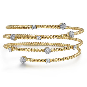 Gabriel & Co. BG4704-6Y45JJ 14 karat yellow gold Bujukan bangle, front view of stacked beaded loops carrying pave discs and single prong set stones