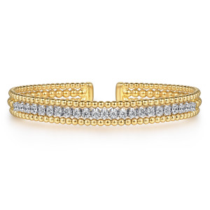 Gabriel & Co. BG4707-6M45JJ 14 karat white and yellow gold Bujukan bangle, front view of a row of round diamonds between two beaded borders, with smooth caps at the gap