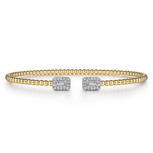 Gabriel & Co. BG4711-6Y44JJ 14 karat yellow gold Bujukan bangle, front view of the two rectangular caps facing each other across the beaded gap