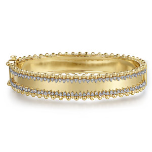 Gabriel & Co. BG4788-65Y45JJ 14 karat yellow gold Bujukan bangle, front view of the smooth center panel framed by two rows of diamonds in pointed settings