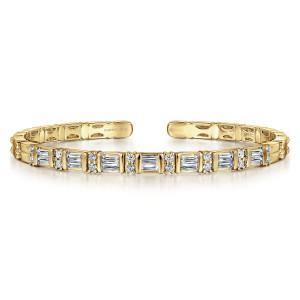 Gabriel & Co. BG4846-62Y44JJ 14 karat yellow gold Lusso bangle, front view of the baguette diamond frames alternating with paired round diamonds across the top