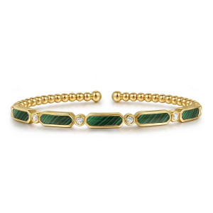 Gabriel & Co. BG4940-57Y45MA 14 karat yellow gold Bujukan bangle, front view of green banded panels alternating with bezel-set round diamonds above beaded ends