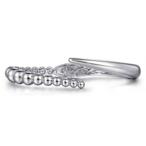 Gabriel & Co. BG4957-57SVJJJ sterling silver Bujukan bangle, front view of the beaded side, the smooth blade and the lattice inside the base