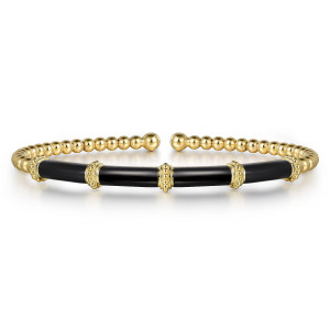 Gabriel & Co. BG4972E8Y4JJJ 14 karat yellow gold Bujukan bangle, front view of the open cuff with its glossy black enamel bar and dotted collars