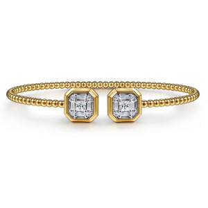 Gabriel & Co. BG5049-57Y44JJ 14 karat yellow gold Bujukan bangle, front view of the beaded cuff with both square caps facing across the gap