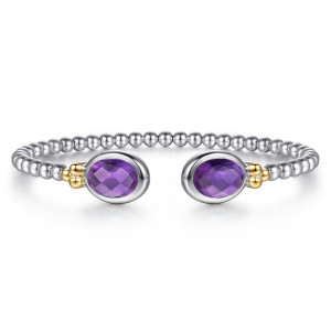 Gabriel & Co. BG5145-57MZJAM sterling silver and 14 karat yellow gold Bujukan bangle, front view of two purple oval stones facing each other across the gap of a beaded cuff