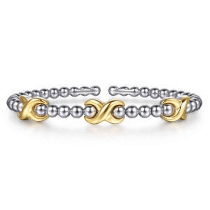 Gabriel & Co. BG5200-57MZJJJ sterling silver and 14 karat yellow gold Bujukan bangle, front view of the beaded cuff showing a gap between the two flat ends
