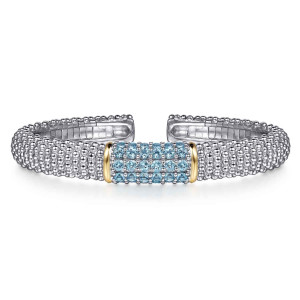 Gabriel & Co. BG5203-57MZJBT sterling silver and 14 karat yellow gold Bujukan bangle, front view of the open cuff with a blue stone block between two smooth bands