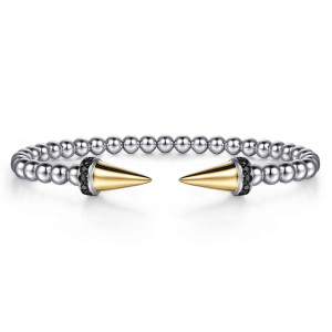 Gabriel & Co. BG5206-57MZJBS sterling silver and 14 karat yellow gold Bujukan bangle, front view of the beaded open cuff with two pointed cone caps facing each other