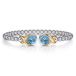 Gabriel & Co. BG5208-57MZJBT sterling silver and 14 karat yellow gold Bujukan bangle, front view of an open beaded cuff with a blue stone at each end