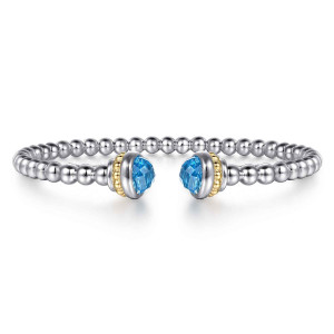 Gabriel & Co. BG5211-57MZJBT sterling silver and 14 karat yellow gold Bujukan bangle, front view of the open beaded cuff with blue stone caps facing each other