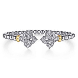 Gabriel & Co. BG5243-57MZJWS sterling silver and 14 karat yellow gold Bujukan bangle, front view of an open beaded cuff with two pave four petal motifs facing across the gap