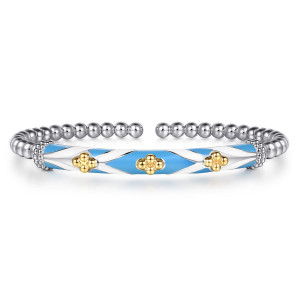 Gabriel & Co. BG5299EM57MZJJJ sterling silver and 14 karat yellow gold Bujukan bangle, front view of the blue enamel bar with its crossing pale bands and three bead clusters