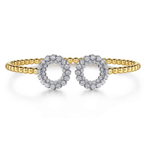 Gabriel & Co. BG5367-57M45JJ 14 karat white and yellow gold Bujukan bangle, front view of the two open diamond rings facing each other at the ends of the beads