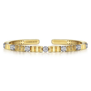 Gabriel & Co. BG5418-57M45JJ 14 karat white and yellow gold Contemporary bangle, front view of the pleated blocks and round diamonds in cups with the smooth end tips apart