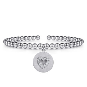 Gabriel & Co. BG5442-57SVJWS sterling silver Bujukan bangle, front view of the brushed disc with its open heart of small stones hanging from the beads