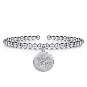 Gabriel & Co. BG5446-57SVJWS sterling silver Bujukan bangle, front view of the beaded cuff with a gap and a hanging disc below the middle