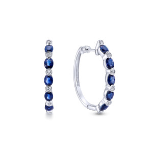 Gabriel & Co. EG10033W45SA 14 karat white gold Color earrings, front view of two matching hoops, blue oval stones alternating with round diamonds, smooth inner side