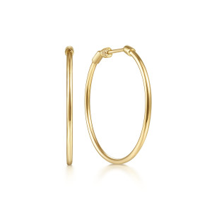 Gabriel & Co. EG13602Y4JJJ 14 karat yellow gold Contemporary earrings, front view of the pair, one hoop edge on and one tilted with its collar up top