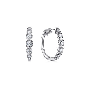 Gabriel & Co. EG13819W45JJ 14 karat white gold Lusso earrings, front view of two huggies with graduated diamonds, one turned to show the hinge seam