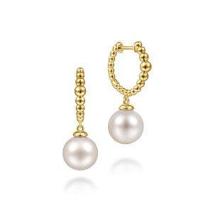Gabriel & Co. EG14162Y4JPL 14 karat yellow gold Bujukan earrings, front view of the pair showing graduated metal beads, a hinge on one huggie and pearl drops