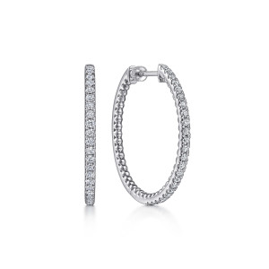 Gabriel & Co. EG14429SVJWS sterling silver Bujukan earrings, front view of two oval hoops, one on edge showing the stone row and one showing the metal bead edge