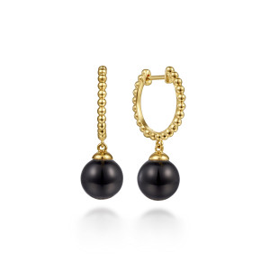 Gabriel & Co. EG14495Y4JOX 14 karat yellow gold Bujukan earrings, front view of the pair, one hoop showing its hinged snap, both with a black ball hanging