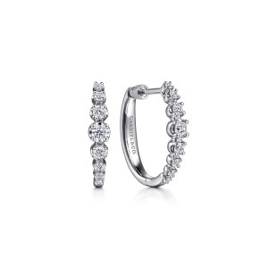 Gabriel & Co. EG14655W45JJ 14 karat white gold Lusso earrings, front view of the pair, one huggie facing forward with stones stepping up toward the middle