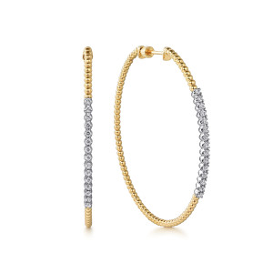 Gabriel & Co. EG14739M45JJ 14 karat white and yellow gold Bujukan earrings, front view of two hoops, one edge on beside one open showing the diamond section at the side