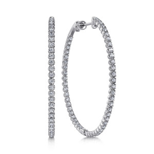 Gabriel & Co. EG14793W45JJ 14 karat white gold Lusso earrings, front view of one oval hoop face on beside its twin edge on, each stone in prongs