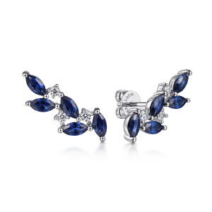 Gabriel & Co. EG14842W45SA 14 karat white gold Color earrings, front view of the pair showing blue marquise stones and small round stones between them