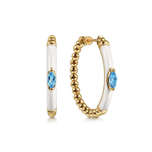 Gabriel & Co. EG15176E9Y4JBT 14 karat yellow gold Bujukan earrings, front view of two hoops, enamel band and blue stone beside the bead arc