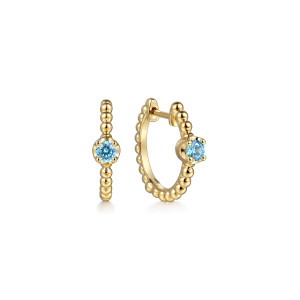 Gabriel & Co. EG15184Y4JBT 14 karat yellow gold Bujukan earrings, front view of the pair, one showing its blue stone and one turned toward the hinge