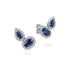 Gabriel & Co. EG15388W45SA 14 karat white gold Color earrings, angled view of the pair showing the oval and pear blue stone halos and a push back